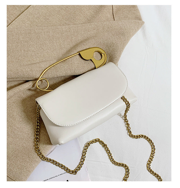 Leather safety -pin handle cross body bag | Clutch Fate 